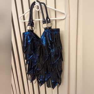 Black and blue purse with gold accents.approx. 18 x 18